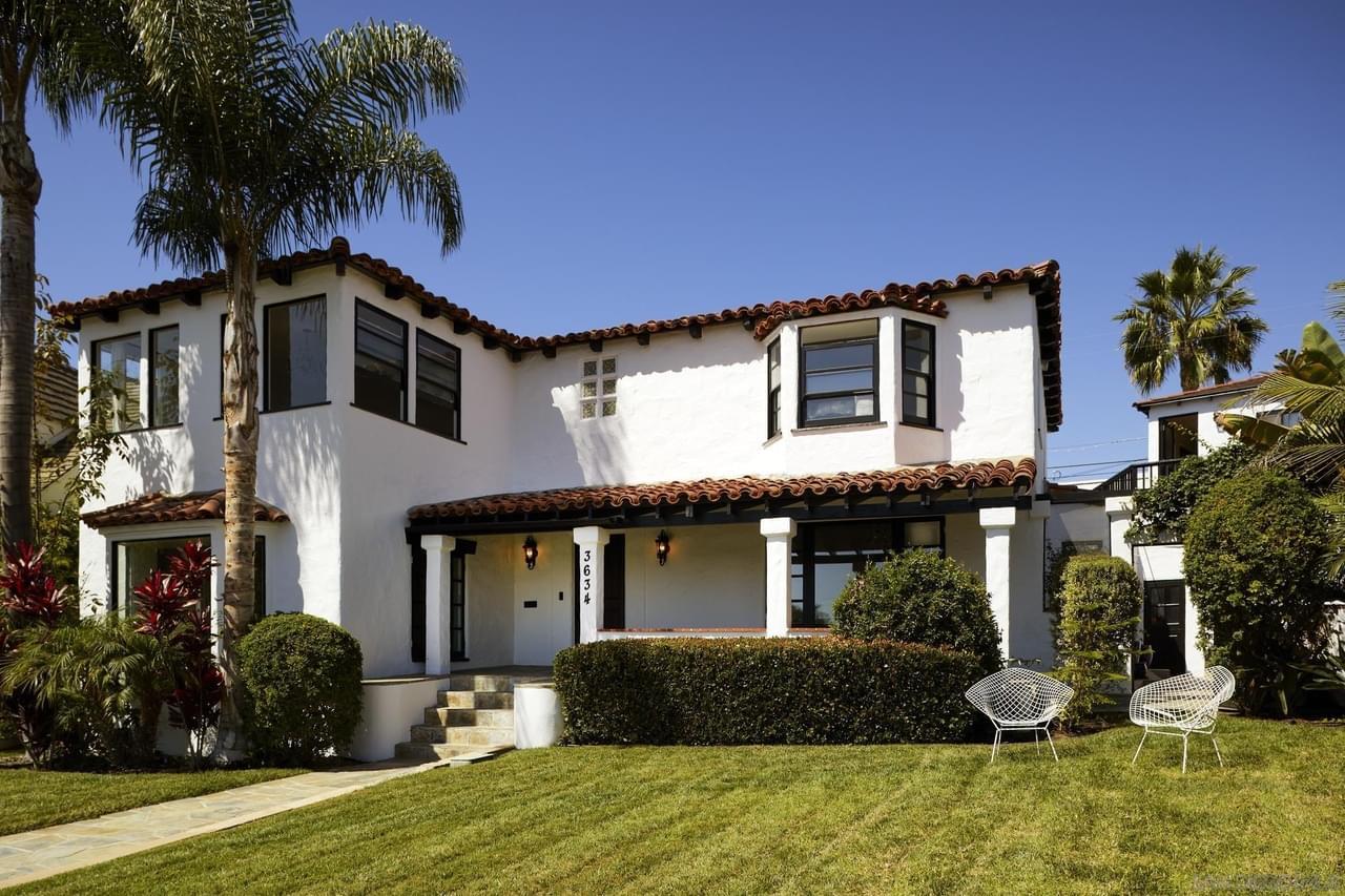 Overlooking highly sought-after & private Plumosa Park w/ views of the Downtown skyline lies this incredible circa 1932 Spanish Revival. Original details throughout; from the tile work & wood flooring to the built-ins for books & decor. 